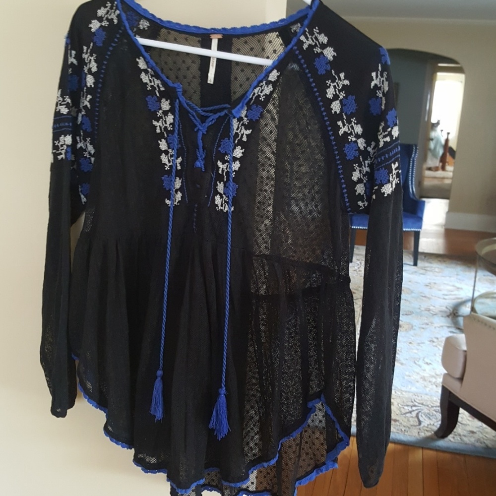 Free People black embroidered blouse.